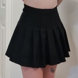 Black pleaded skirt